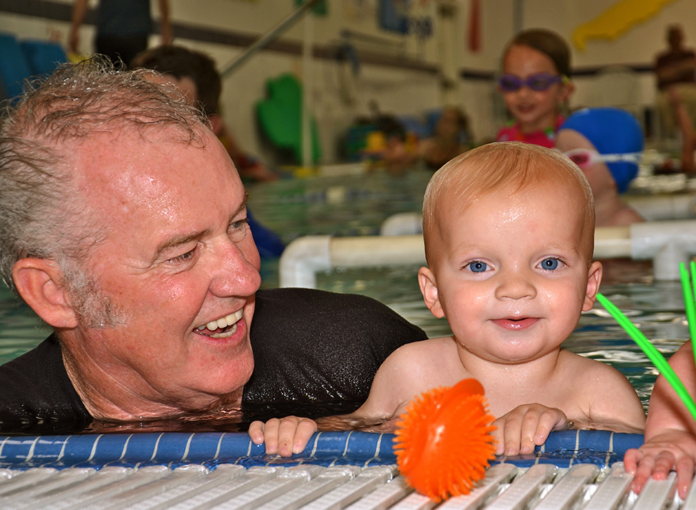 father and son swim lesson